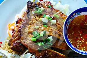 Chop with rice on a white plate Ã¢â¬â Tradition street food in vietnam photo